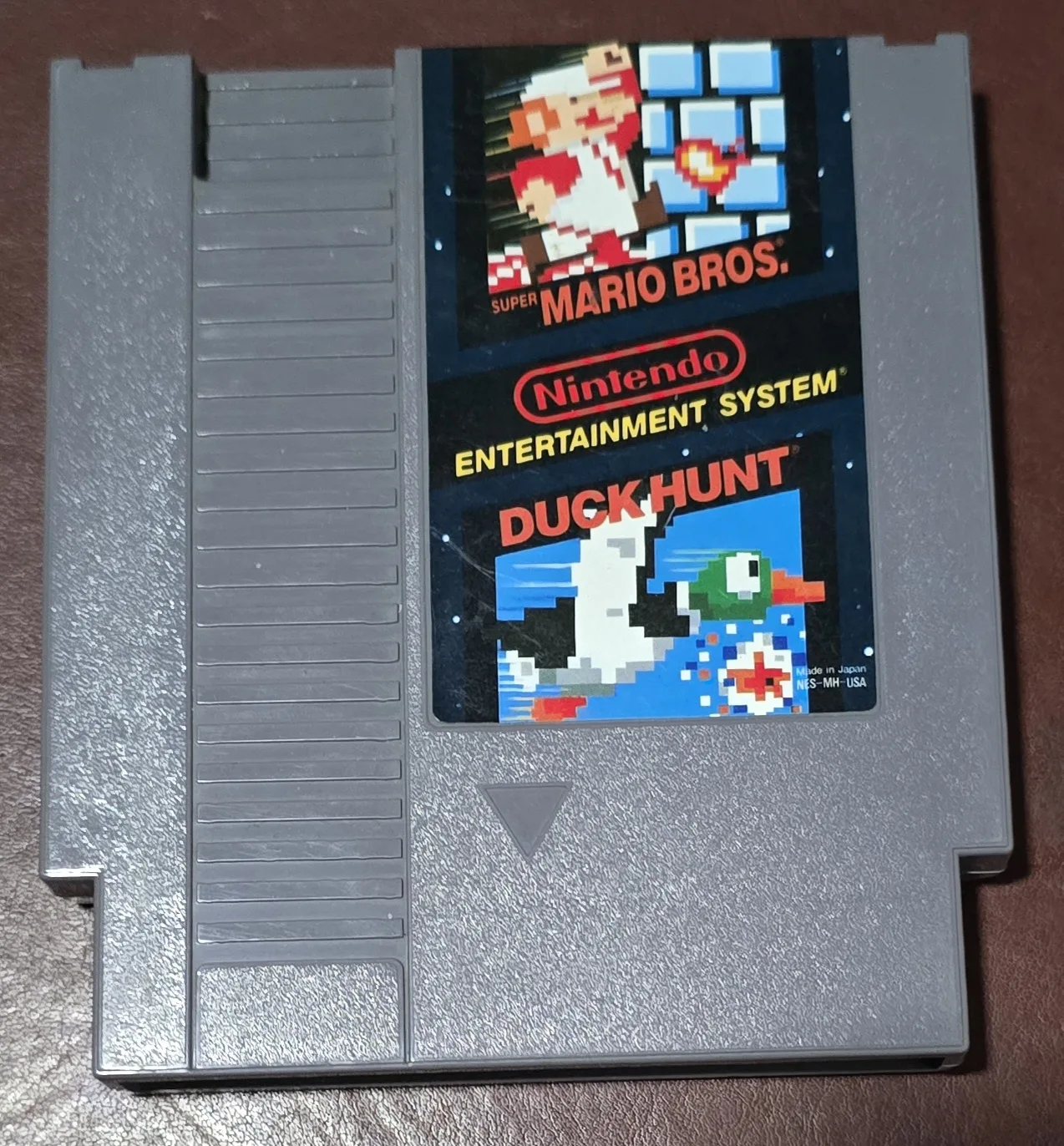Front of an authentic Nintendo Super Mario Bros. slash Duck Hunt combo cartridge for the NES
