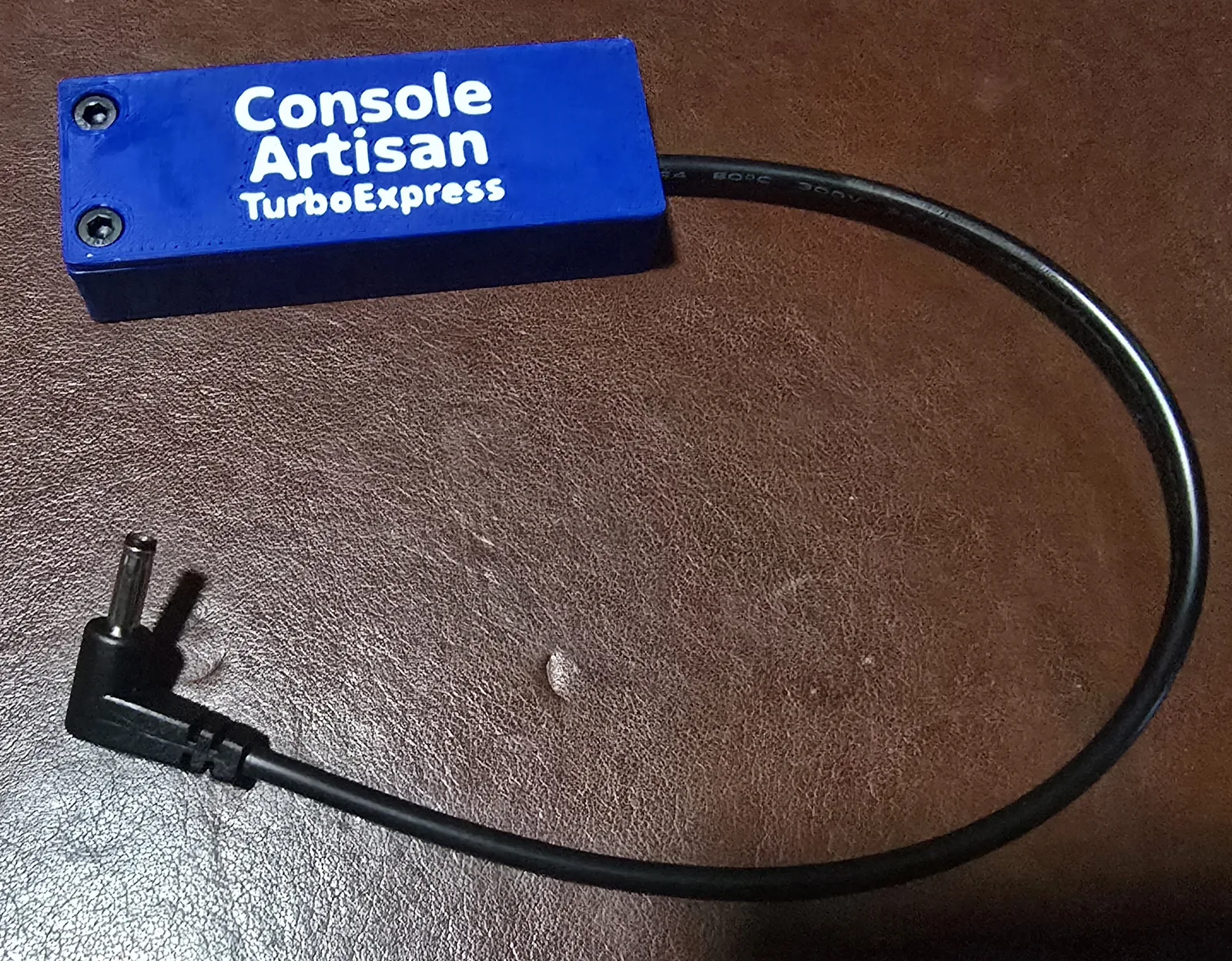 Front of the finished USB-C 7.5V TurboExpress power adapter, labeled Console Artisan TurboExpress, with its right-angle barrel cable